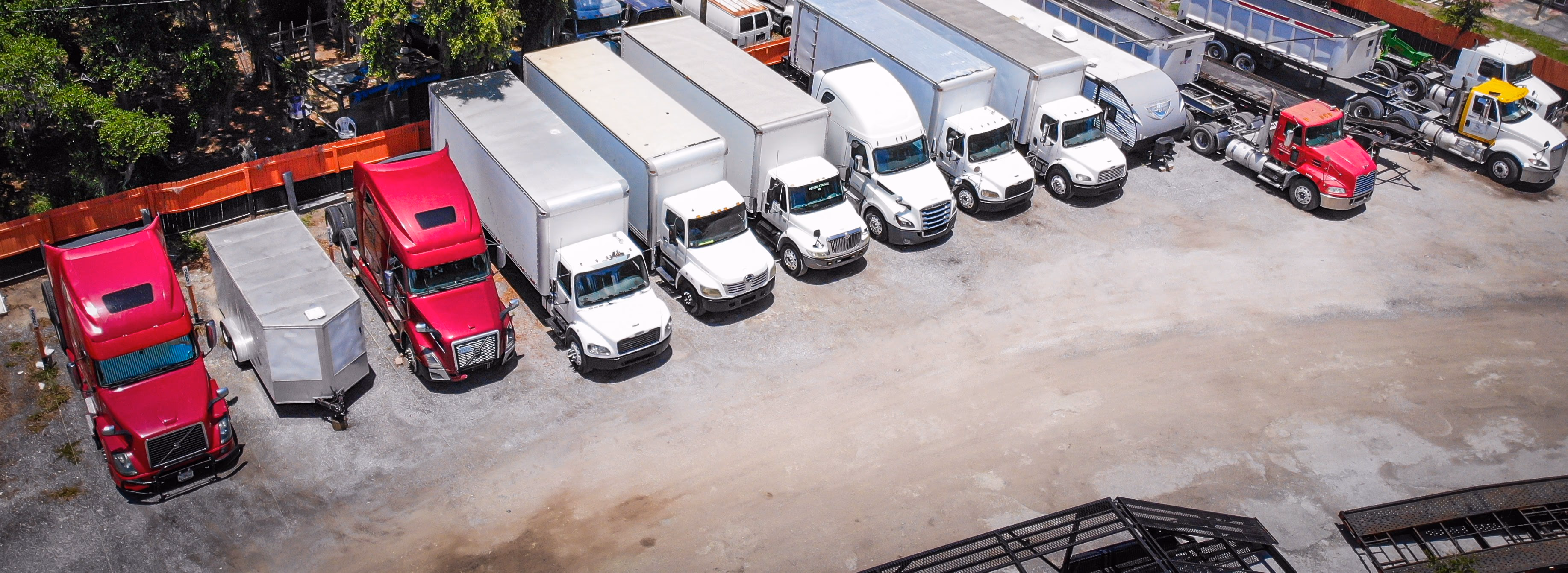 Commercial box trucks parked at GO Storage USA, Davenport Florida